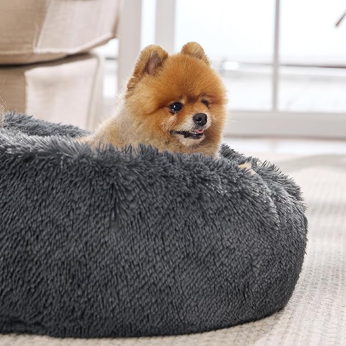 Bedsure Calming Dog Bed for Small Medium Dogs - Donut Washable Medium Pet Bed, 27 inches Anti-Slip Round Fluffy Plush Faux Fur Cat Bed, Dark Grey